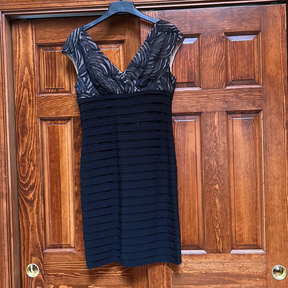 Beautiful black cocktail dress with lace top